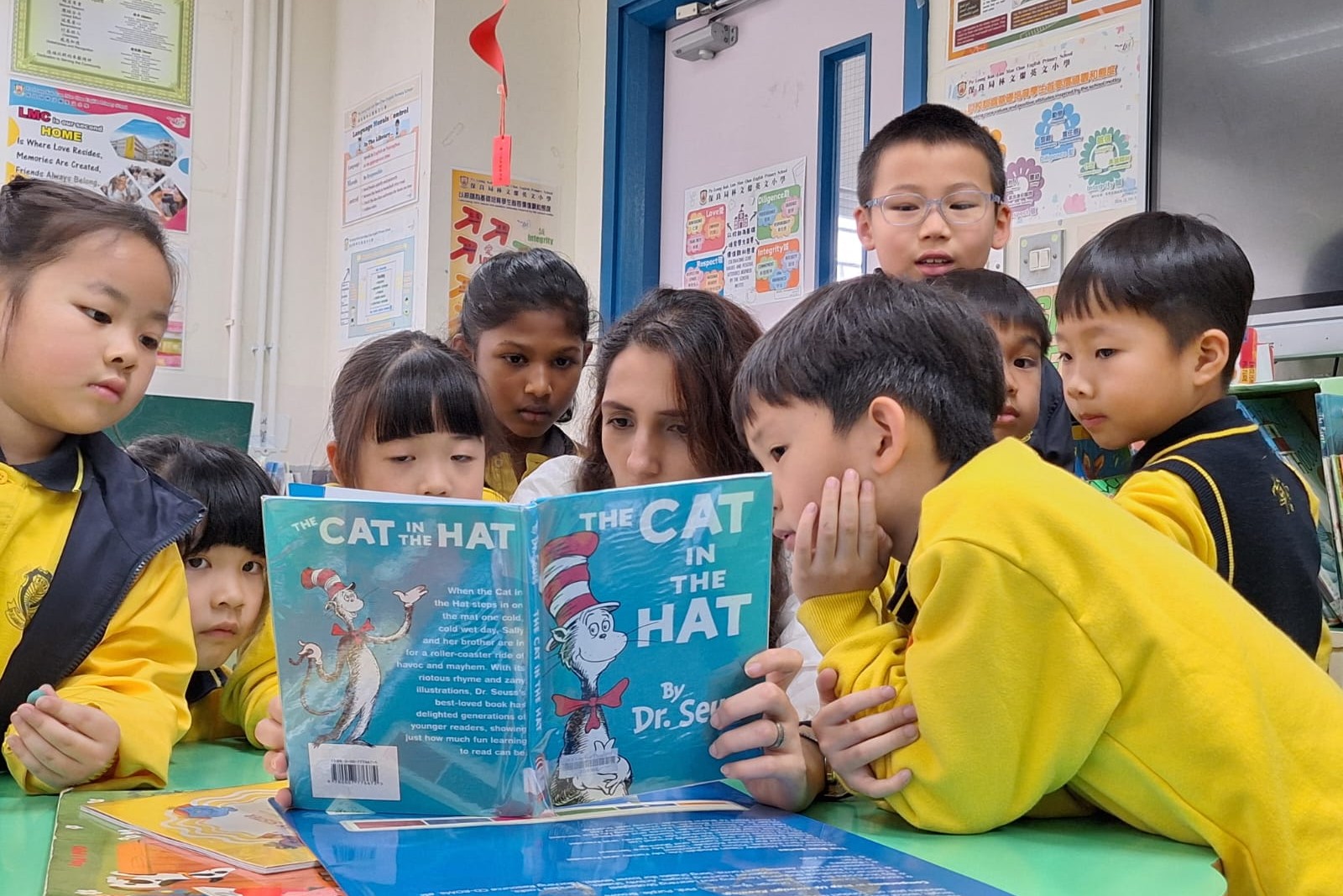 The teacher is sharing the good book